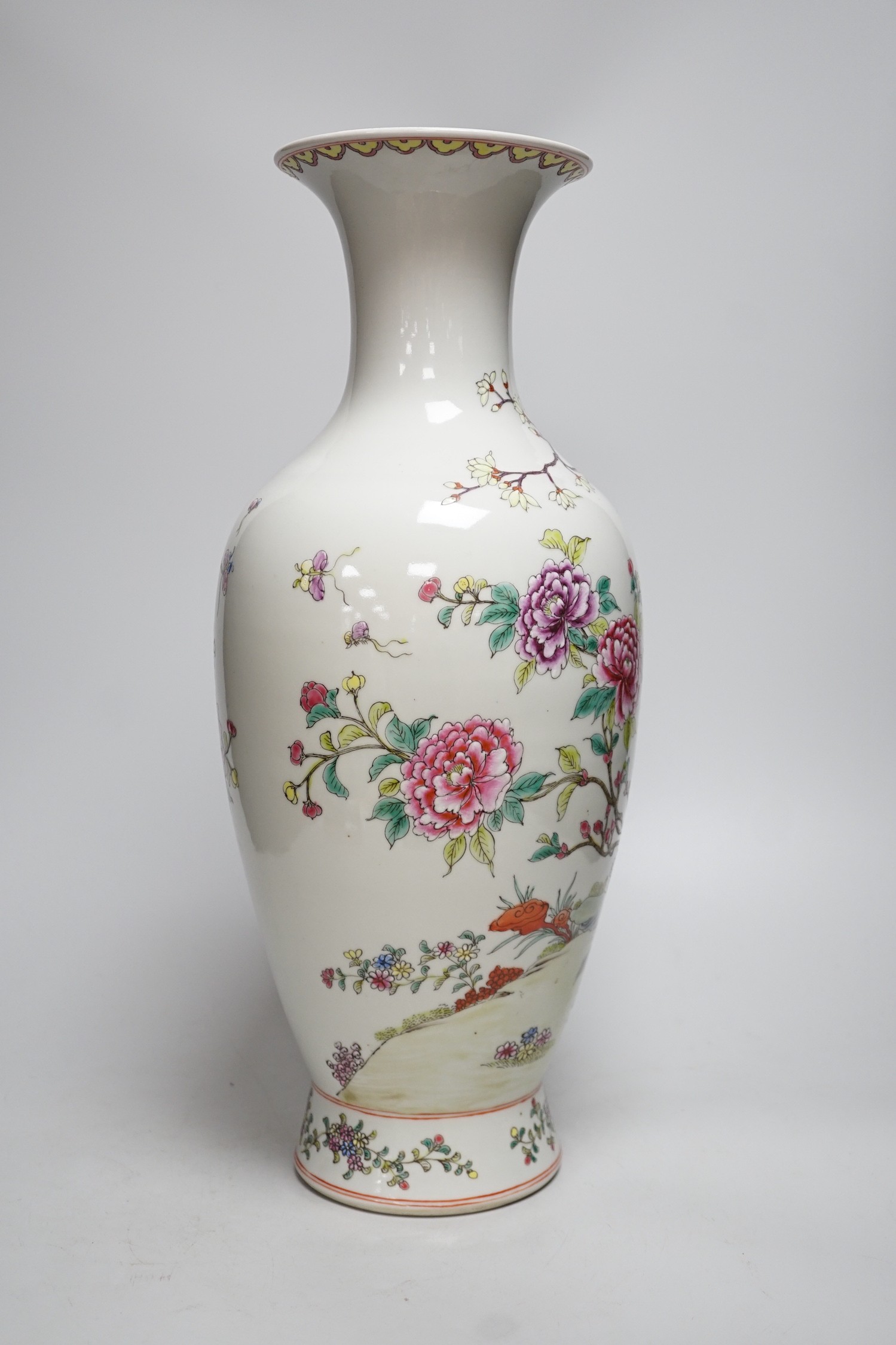A large Chinese famille rose peacock vase. 46cm tall